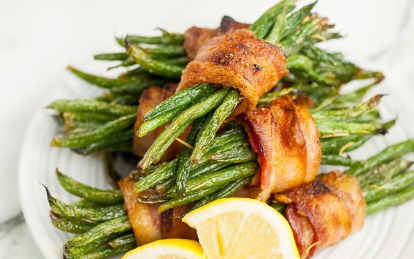 Bundles of green beans wrapped in bacon.