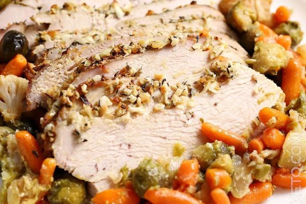 Garlic butter turkey breast served with fall veggies. 