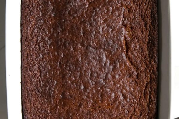 Persimmon pumpkin cake in a casserole dish.