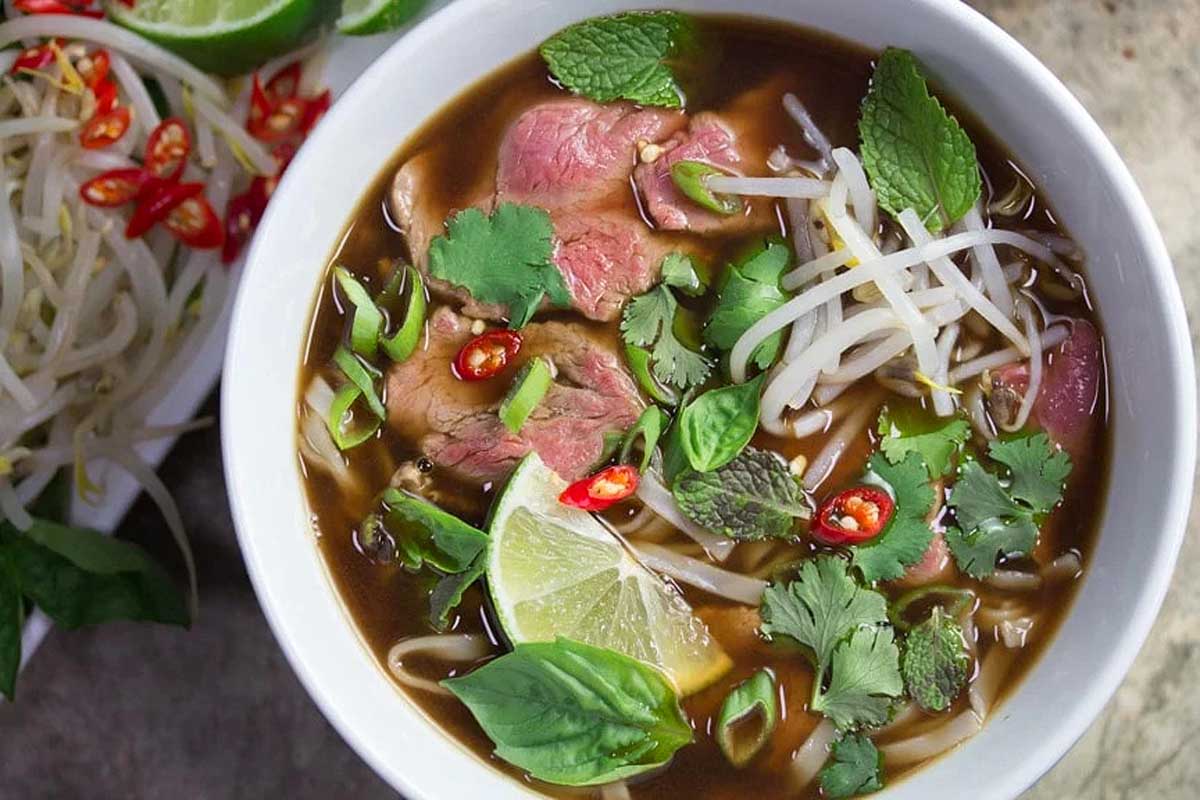  Beef Noodle Soup in a white bowl.
