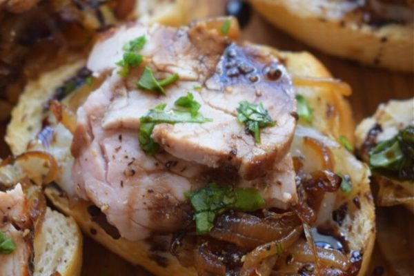 Pork Tenderloin Crostini with toppings.