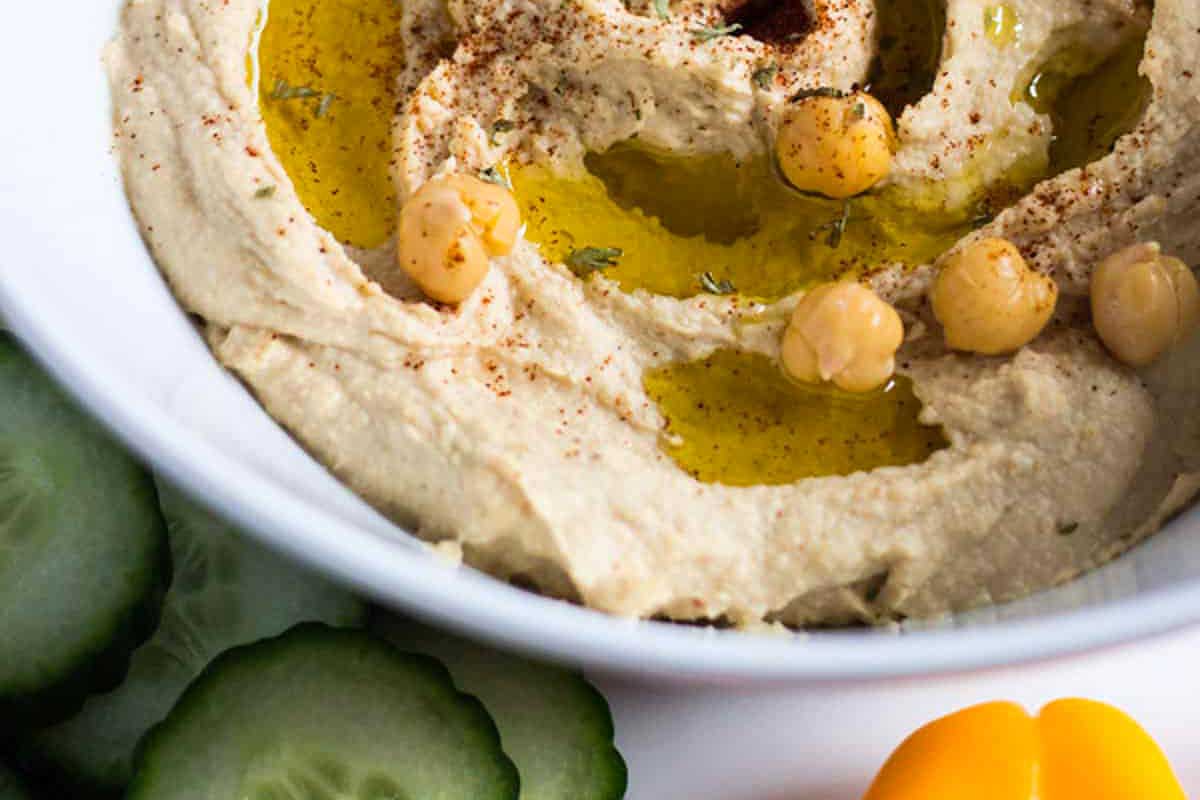 Smooth & Creamy hummus in a bowl.