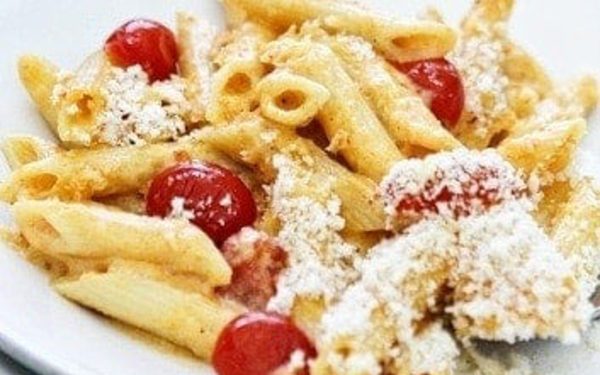 Mac and cheese with tomatoes and parmesan.