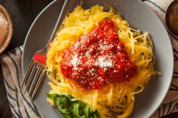 Spaghetti squash with meat and red sauce.