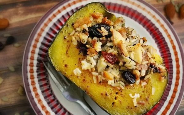 Buttercup squash on a plate with toppings.