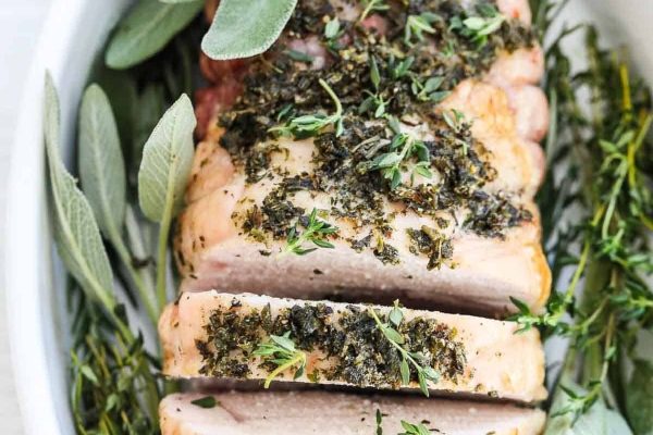 Slices of turkey breast with herbs. 