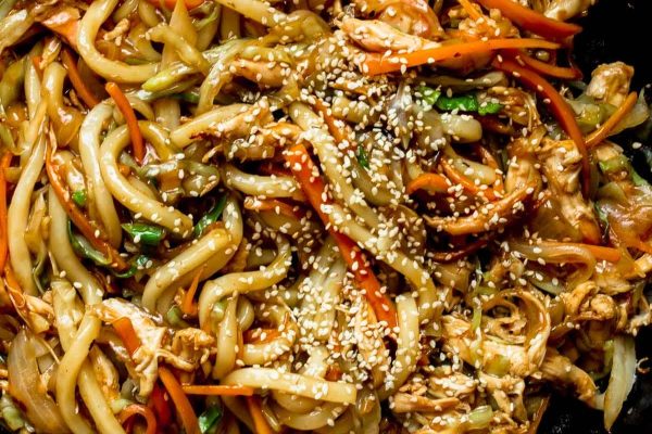 Teriyaki Chicken Yaki Udon (Stir-Fried Udon Noodles). and sprinkled with sesame seeds.
