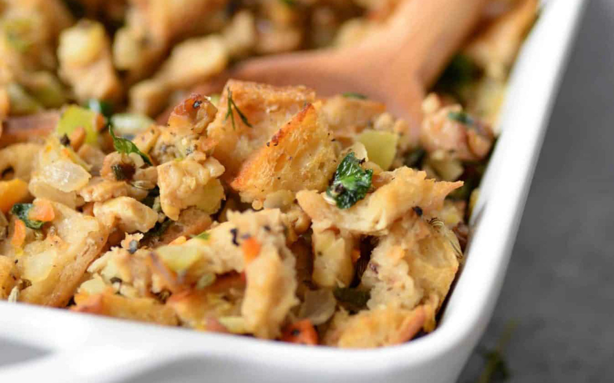 Stuffing in a white casserole dish.