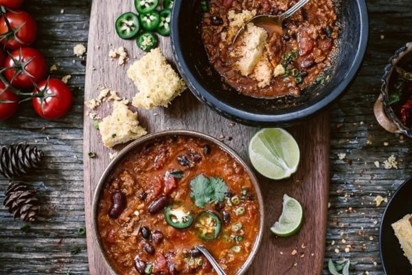Two bowls of three bean turkey chili.
