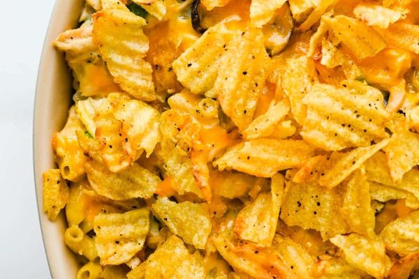 Tuna noodle casserole on a white casserole dish.