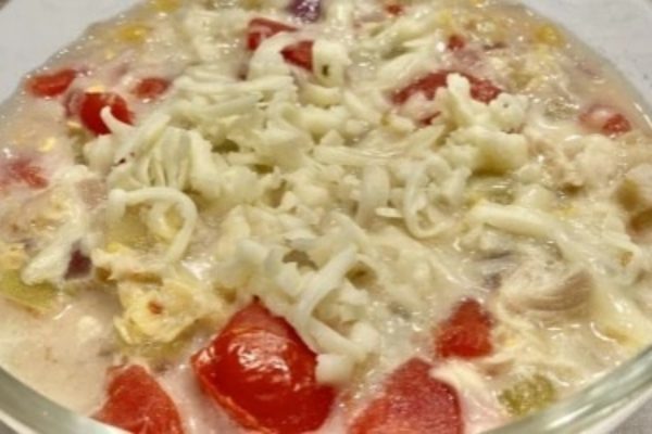 Turkey Corn Chowder Southwest Style on a clear dish. 