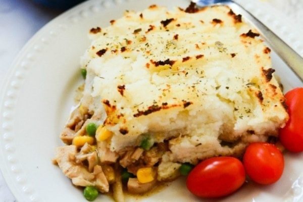 Leftover turkey shepherd's pie served on a plate. 