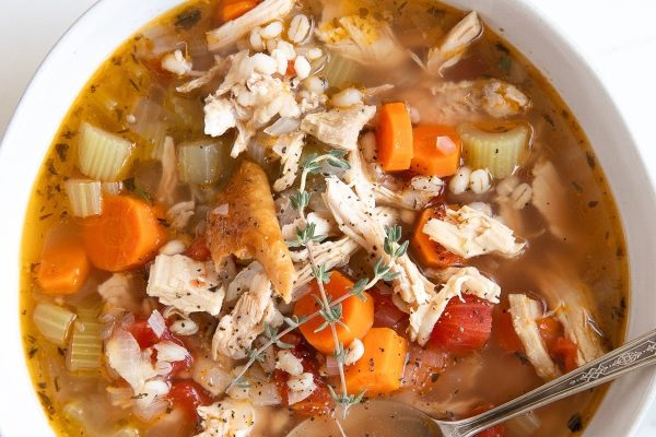 A hearty bowl of leftover Thanksgiving turkey soup.