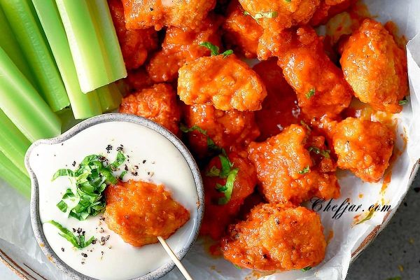Air fryer chicken bites with dressing.