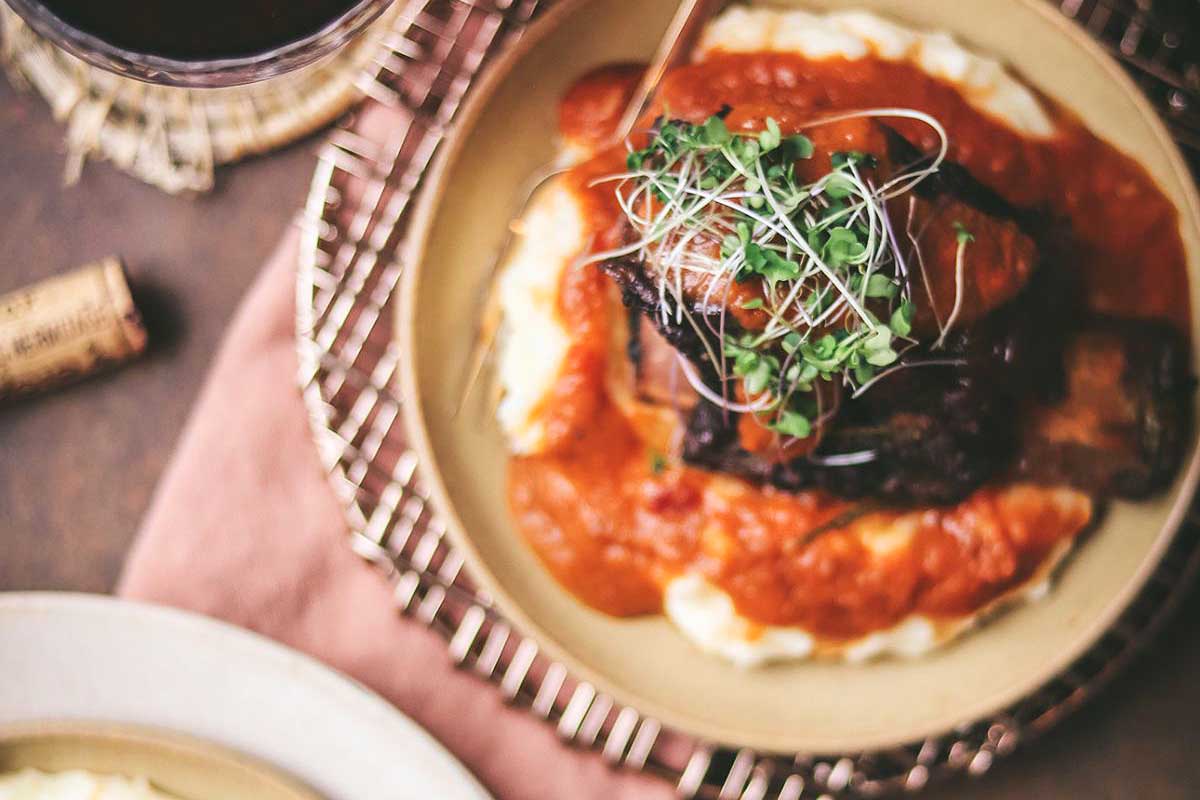 Beef short ribs slowly braised in sauce.
