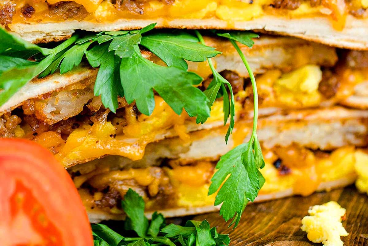 Breakfast Crunchwrap on a cutting board.