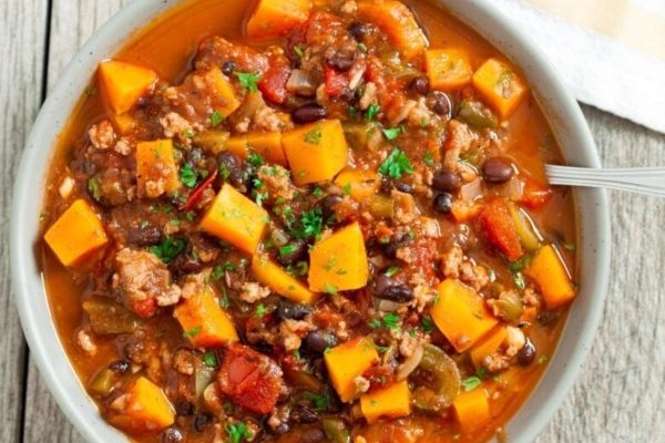 Big bowl of chili with squash.
