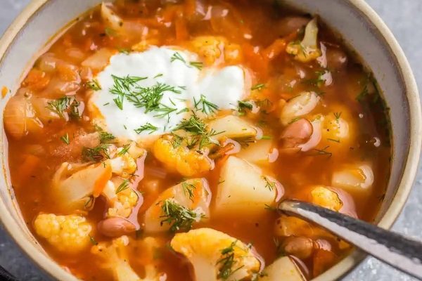 Cauliflower white bean soup with sour cream.