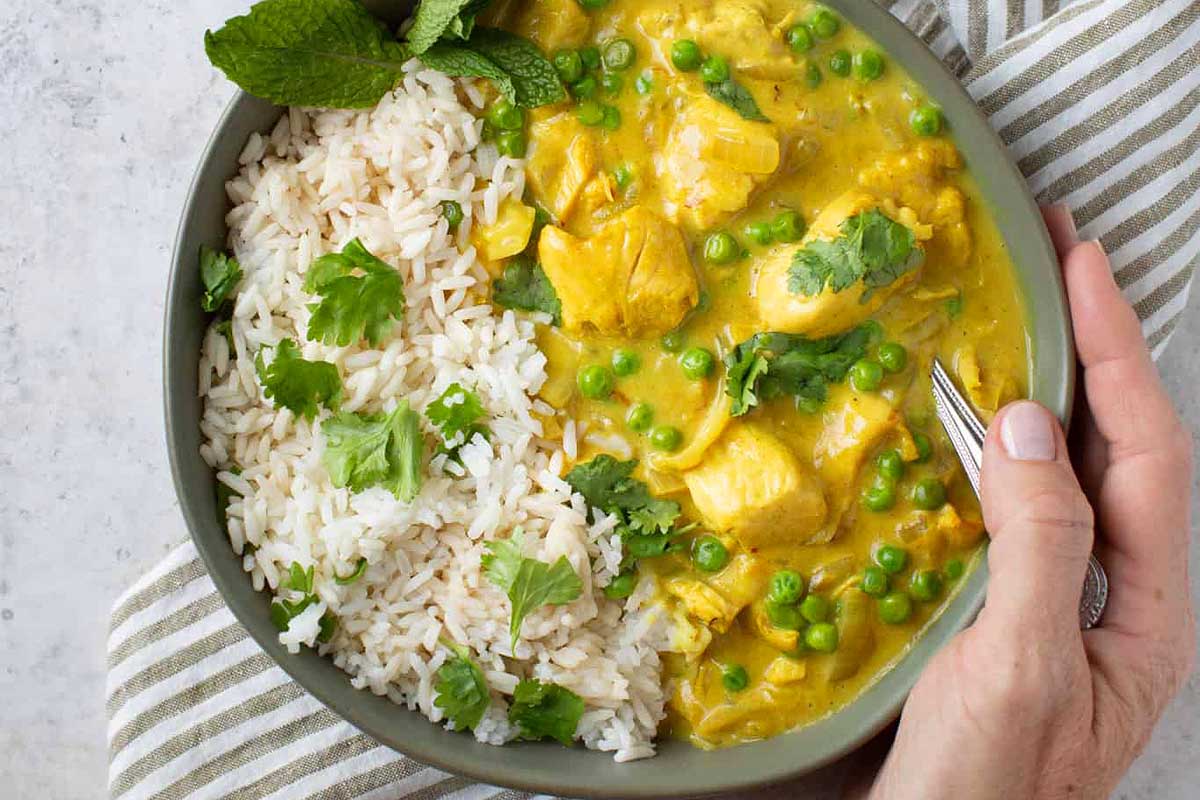 Chicken Curry with rice in a bowl.