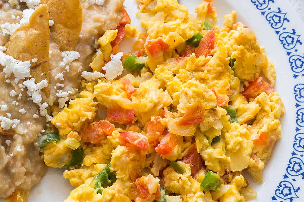 Mexican egg dish with beans and vegetables.