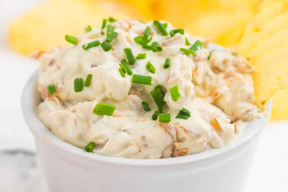 French onion dip win a white bowl. 