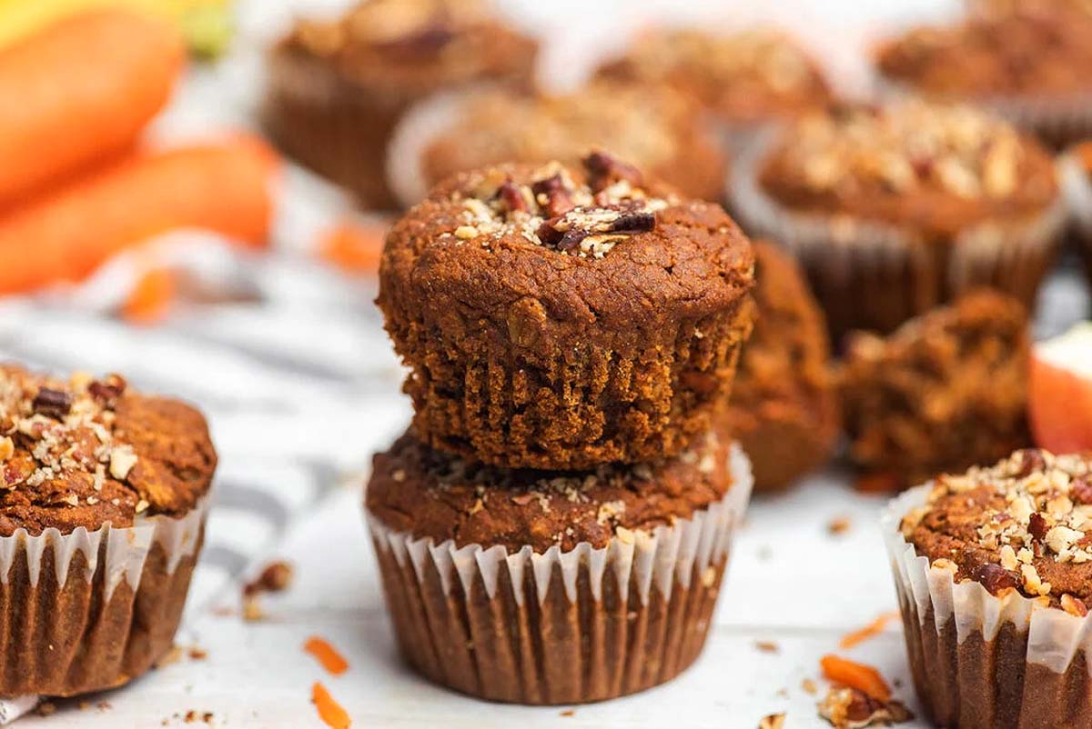 Fresh baked morning glory muffins on the counter.