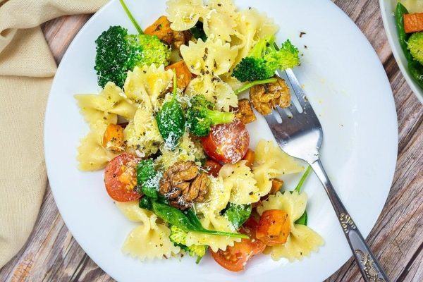 Pasta salad on a white plate.