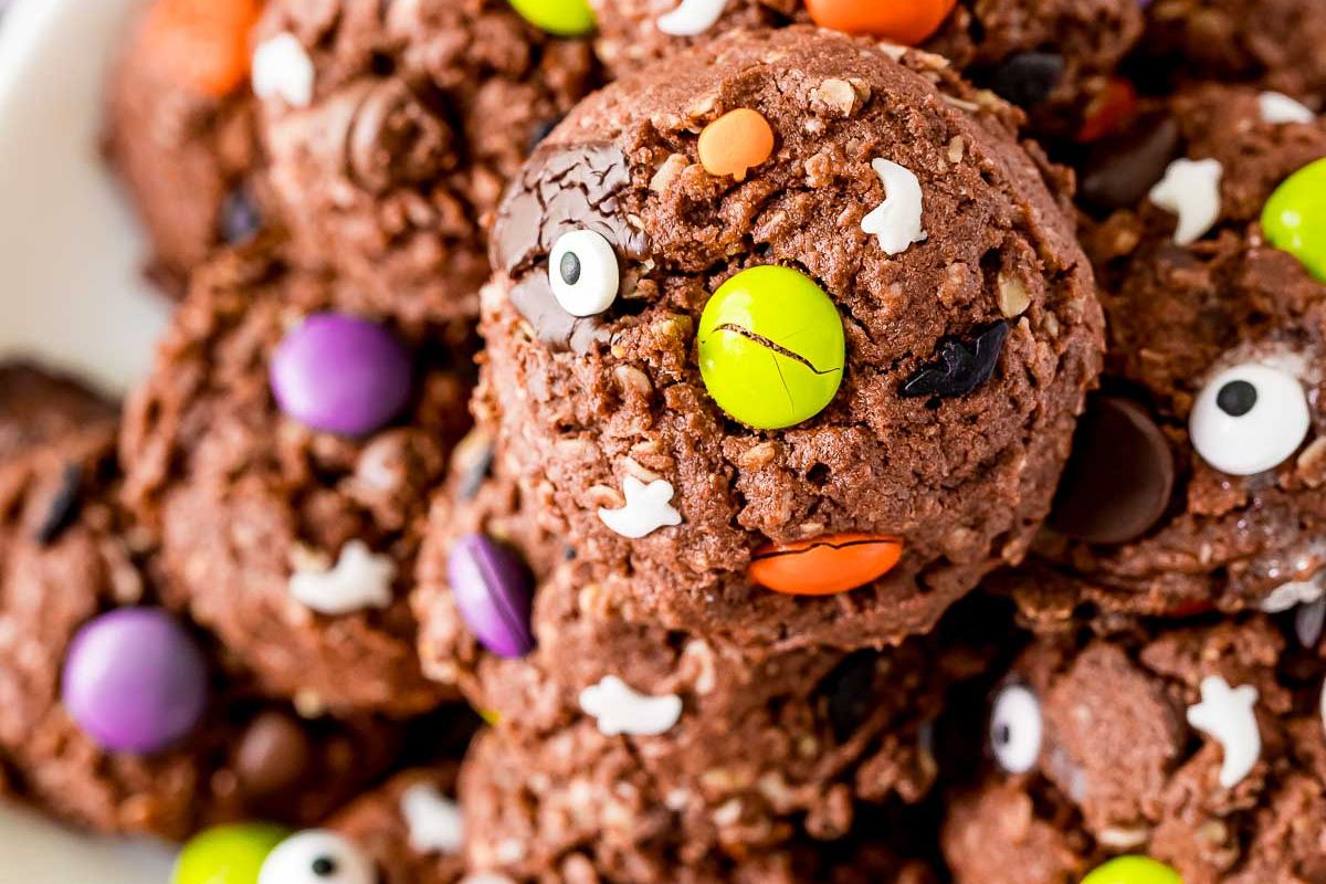 Halloween monster cookies stacked up with eyes.