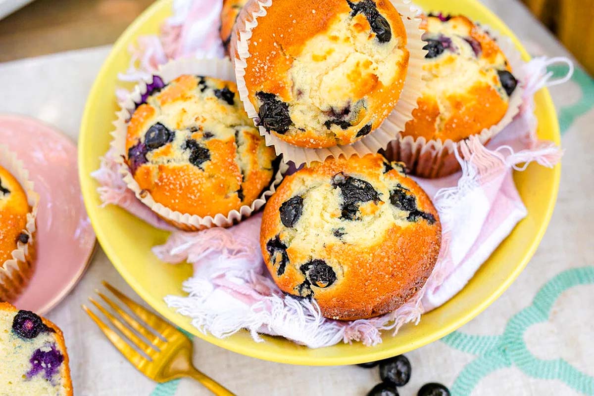 Bakery style blueberry muffins in a bowl. These are the best muffin recipes!