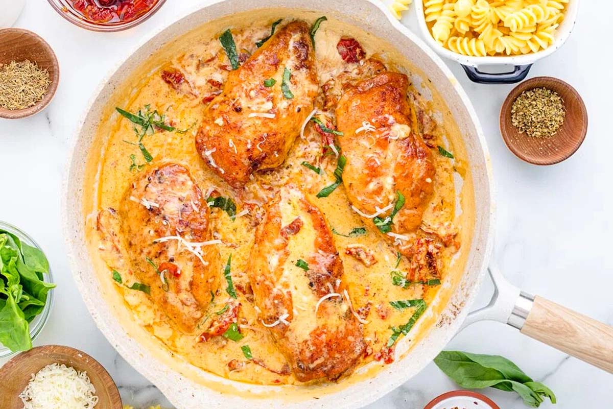 Overhead view of a skillet with marry me chicken. 