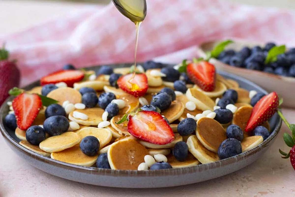 A bowl with mini pancakes. 