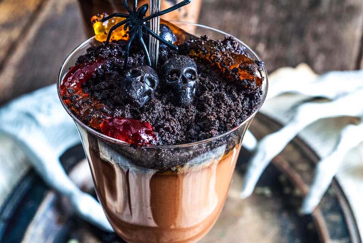 A Halloween pot de creme dessert with skulls on top.
