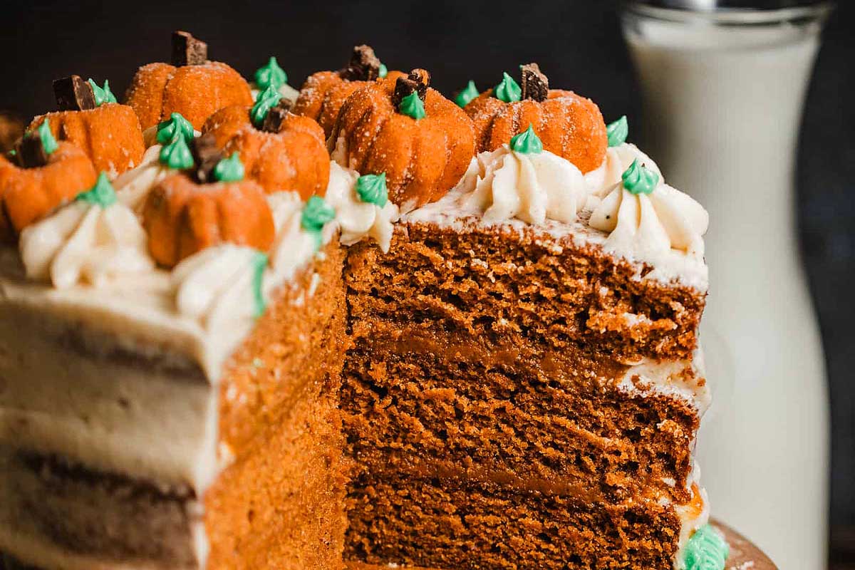 Brown Butter Pumpkin Cake with icing pumpkins on top.