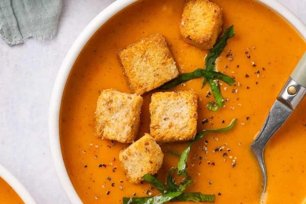 Red pepper soup with croutons.
