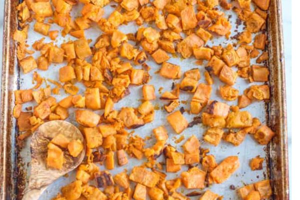 roasted sweet potatoes on a sheet pan.