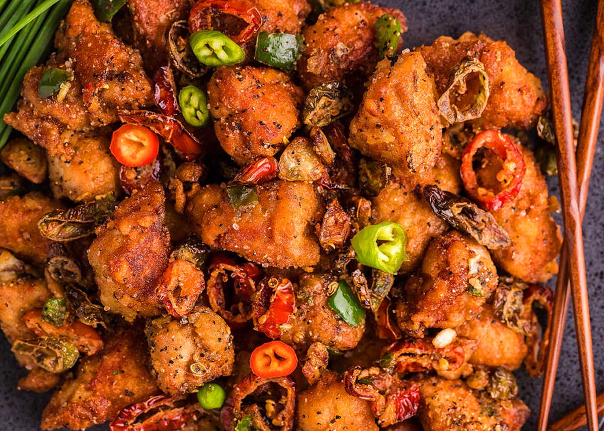 Salt & Pepper Pork Chop Bites on a baking tray.