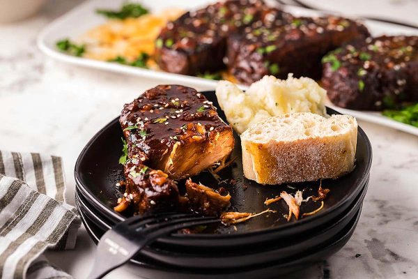 Honey pork chops served on a plate.