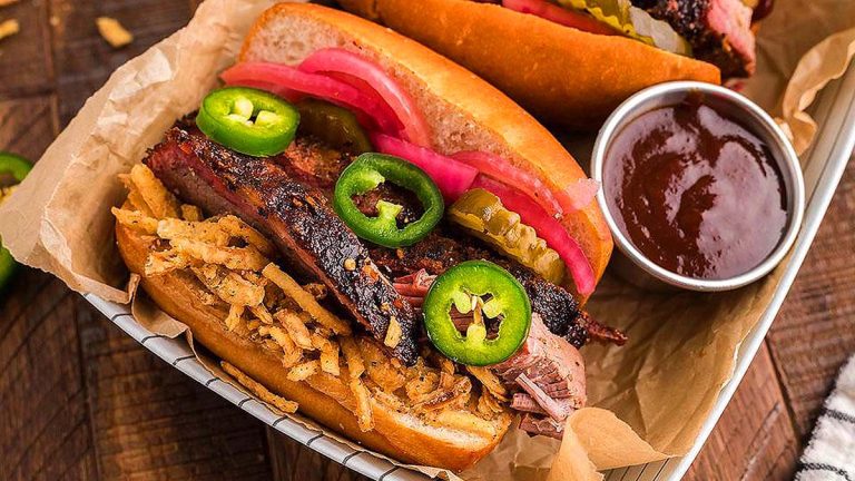 A smoky bbq brisket sandwich with jalapenos and a tangy ketchup twist.