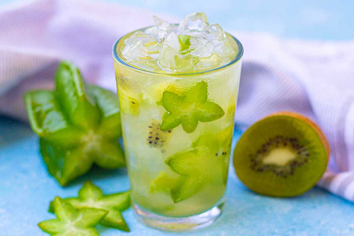 Kiwi starfruit refresher drink in a glass.