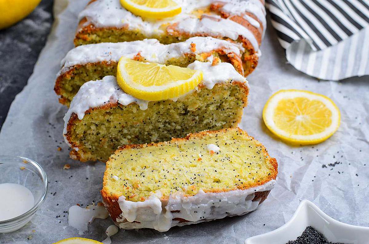 A loaf of lemon cake with lemon slices. This is one of the best loaf recipes.
