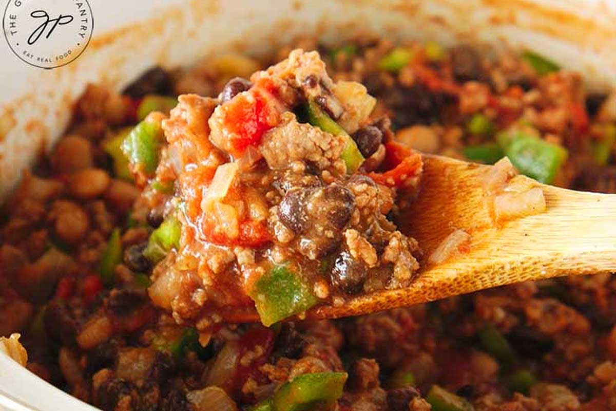 Beef Chili Recipe with a spoon picking it up.