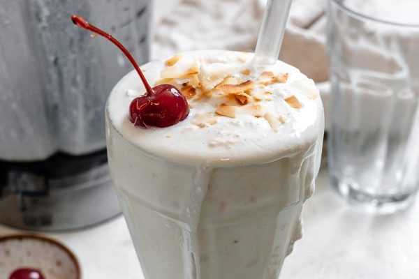 Explore mouthwatering milkshake recipes topped with whipped cream and a cherry on top.