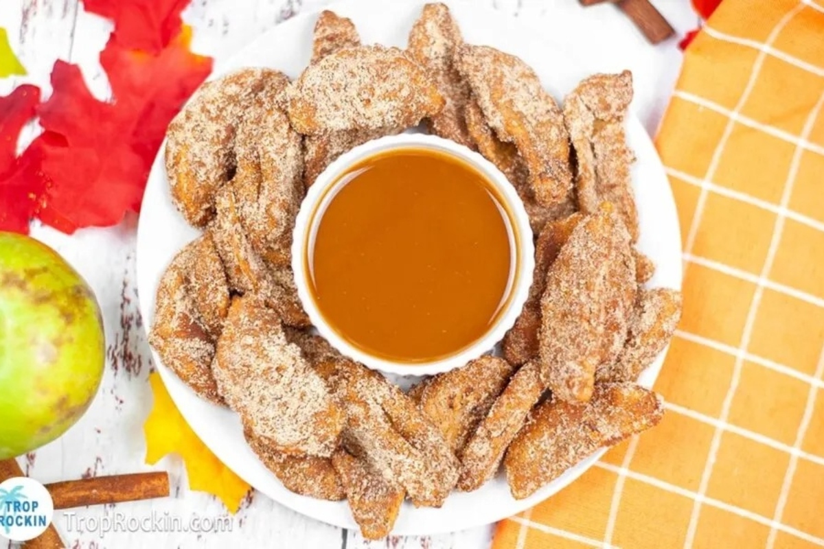 A plate of apple cinnamon fudge drizzled with a sauce.