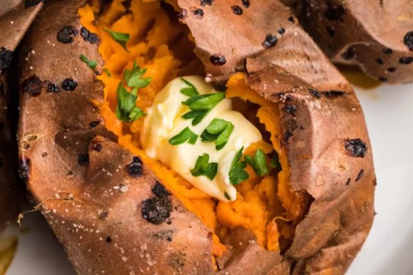 Grilled sweet potatoes with butter and chives, a perfect side dish for turkey.