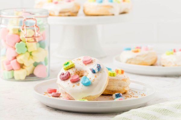 St patrick's day donuts on a white plate.