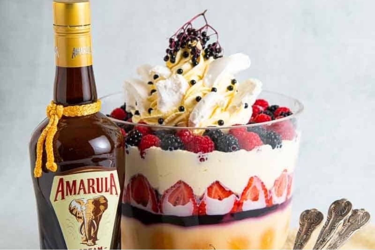 A cup of whipped cream topped with a drizzle of amarula