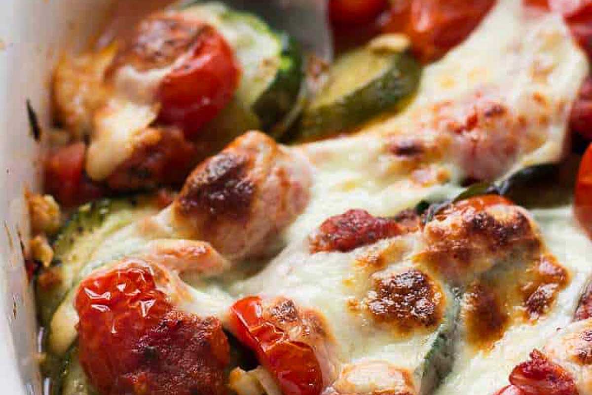 A delicious casserole dish filled with tender chicken, fresh zucchini, and vibrant tomatoes. Prepare this recipe for a satisfying meal that will impress your family and friends.