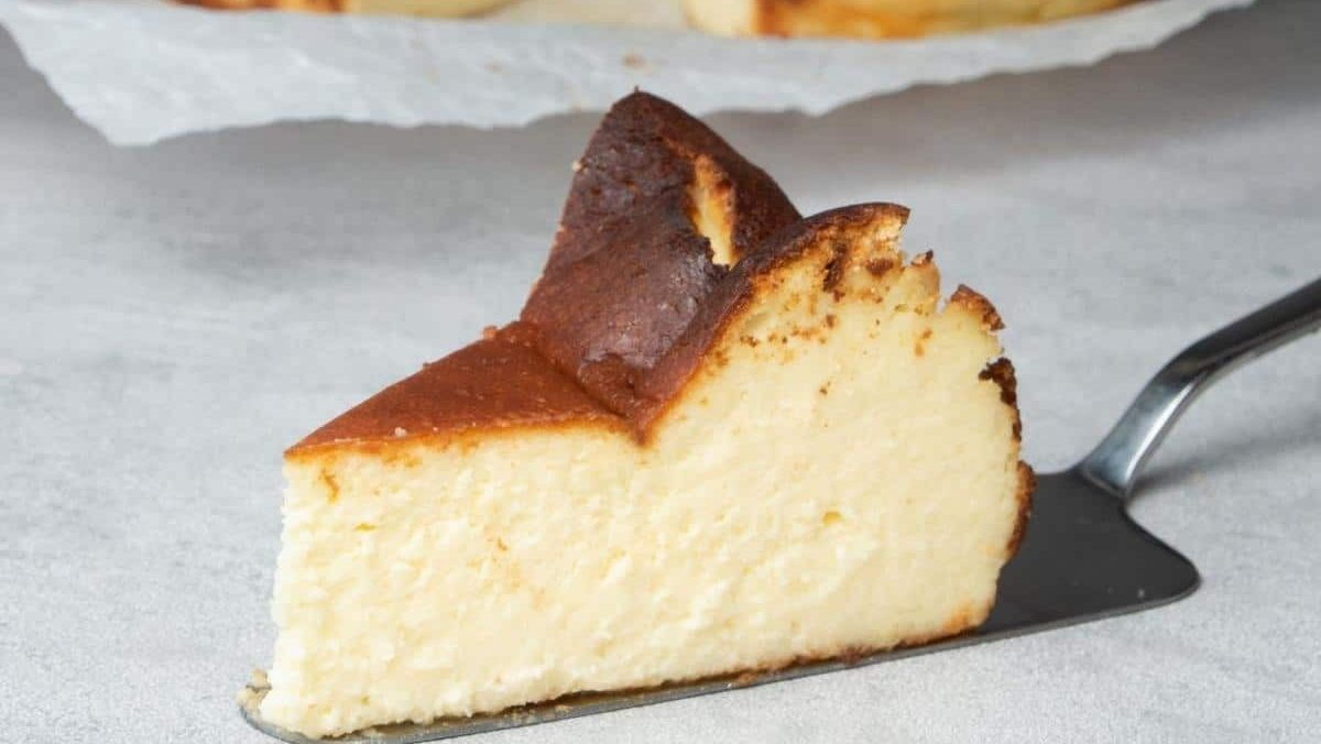 A slice of cheesecake on a plate.