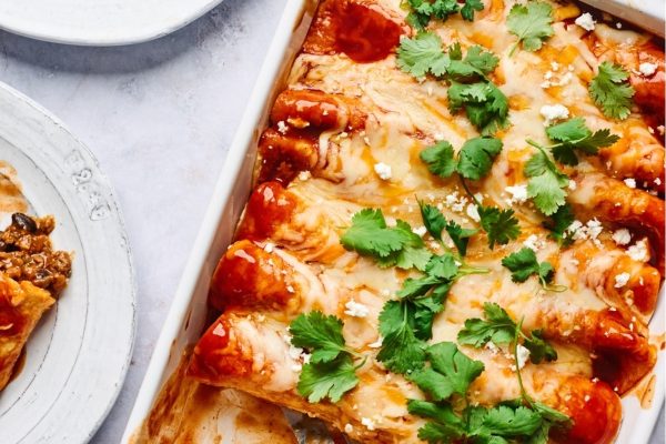Mexican enchiladas in a baking dish.