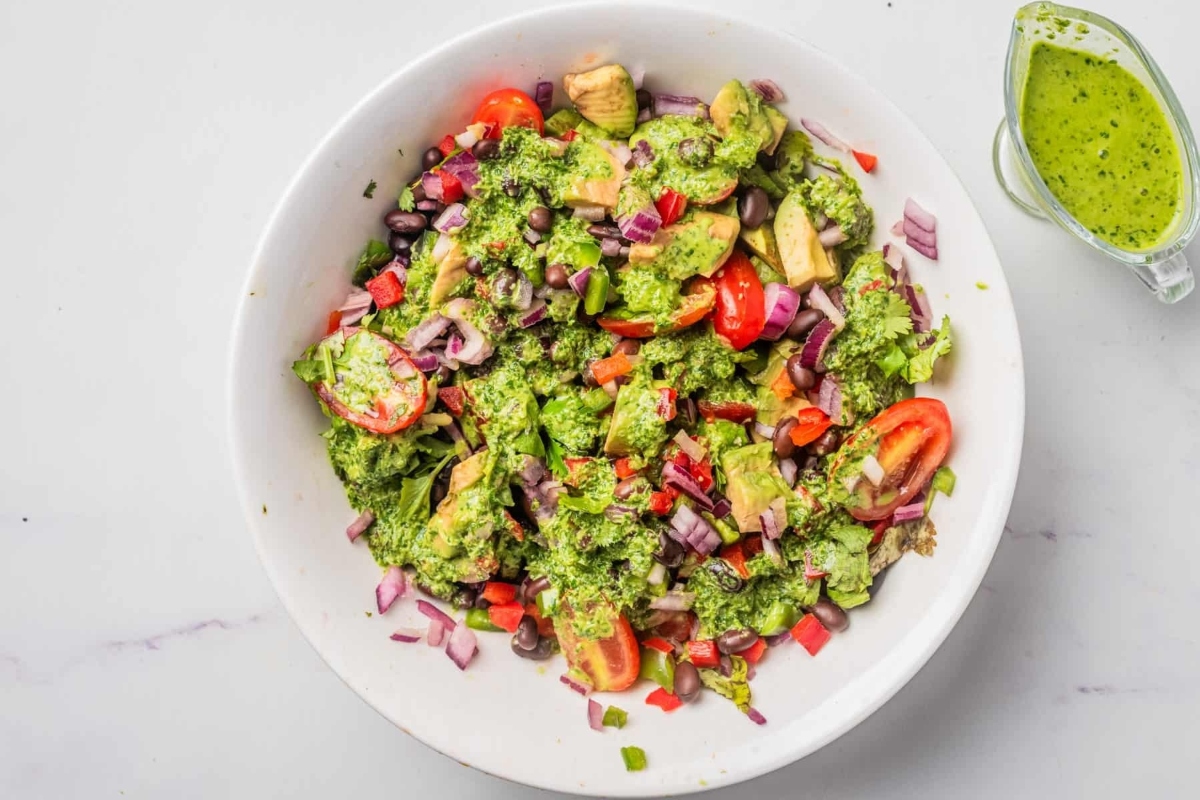 Black bean salad in a white bowl.